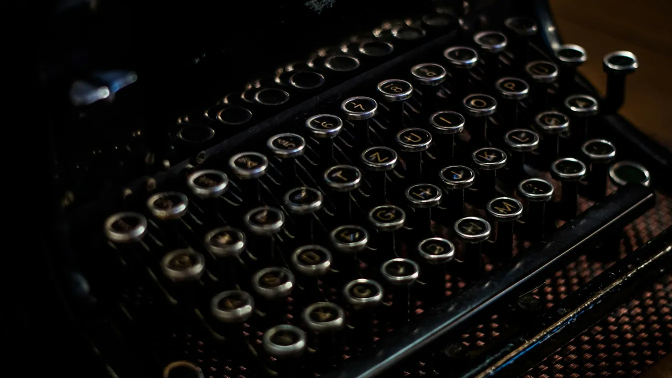 a close up of an old typewriter