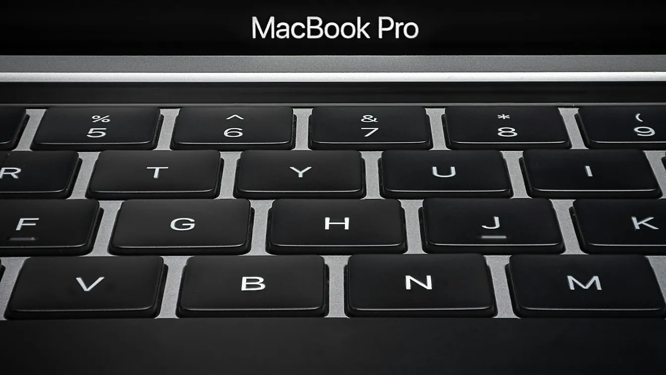 a close up of the keyboard on a macbook pro