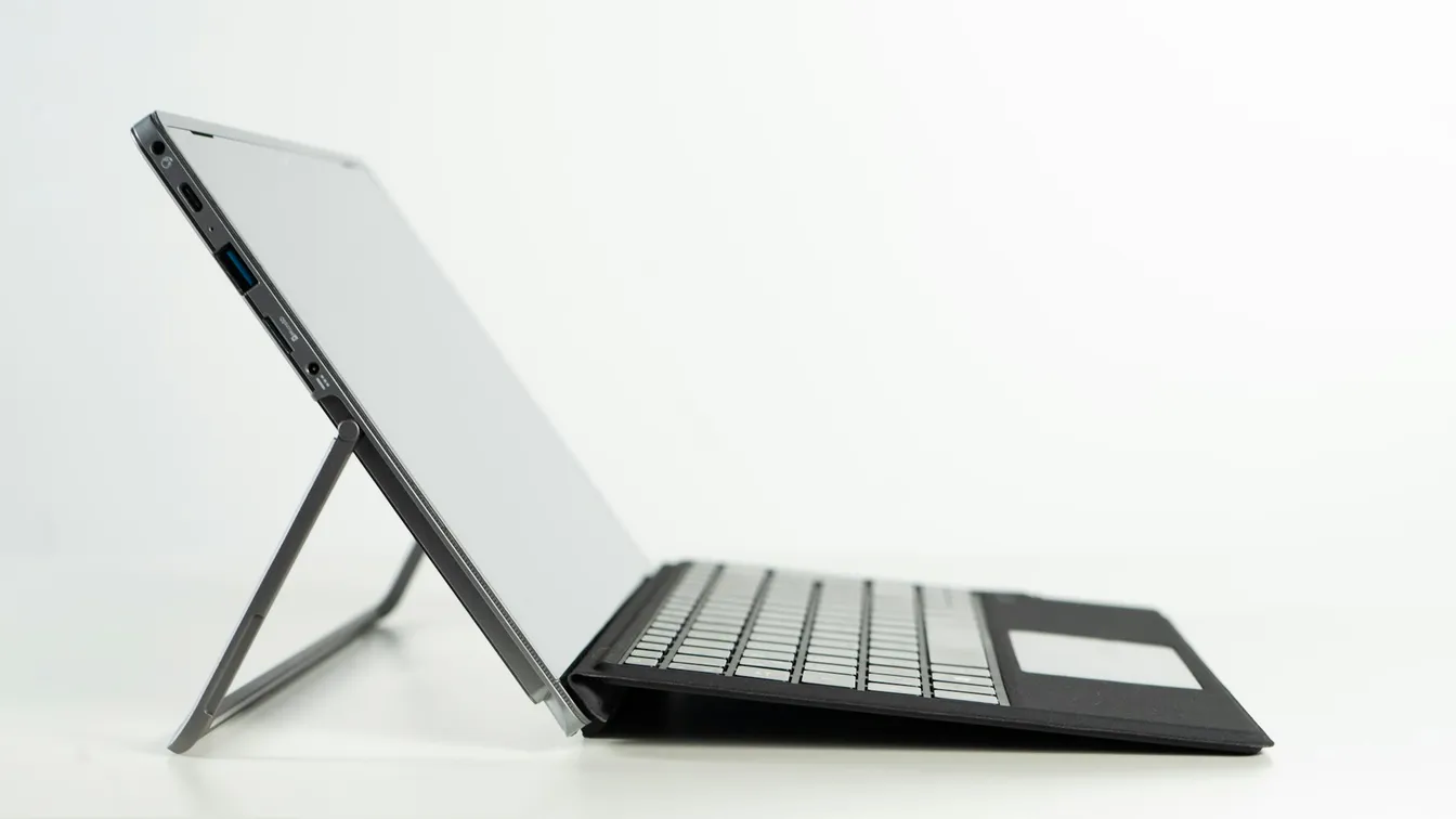 a laptop with a keyboard on top of it