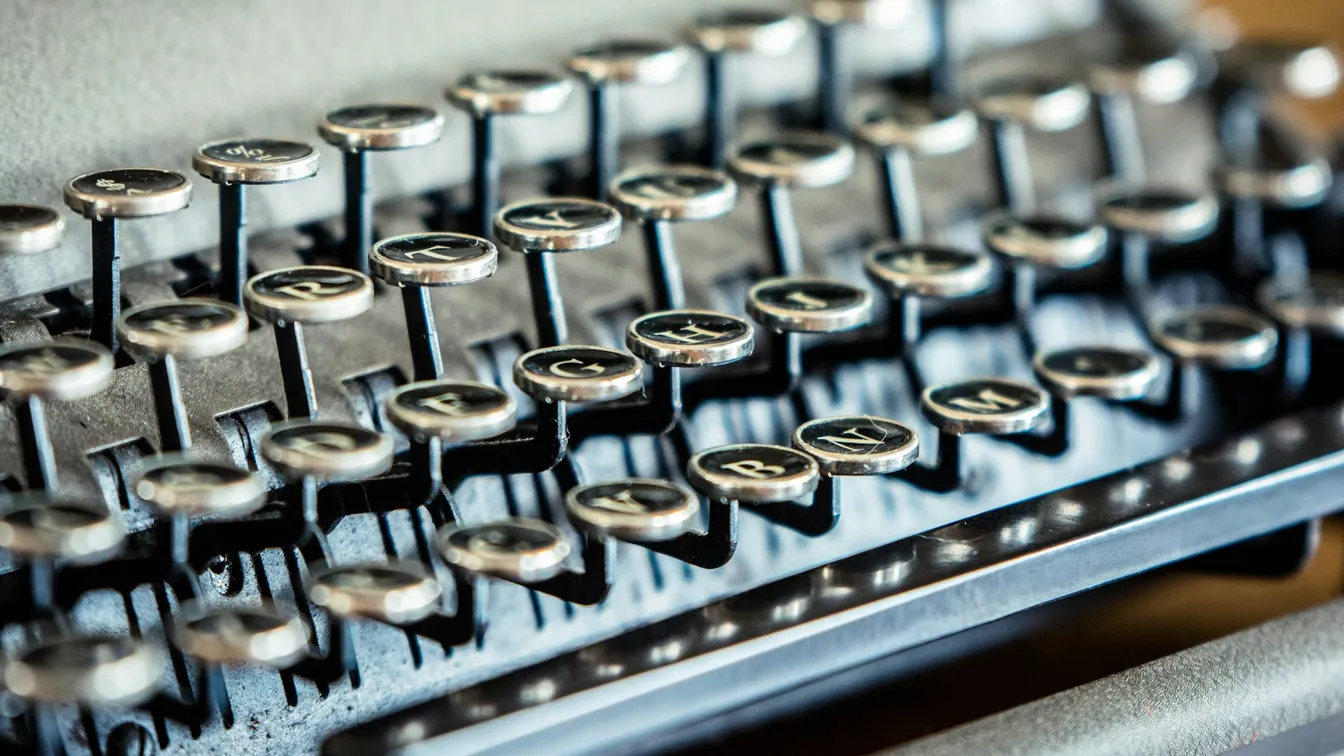 a close up of an old typewriter